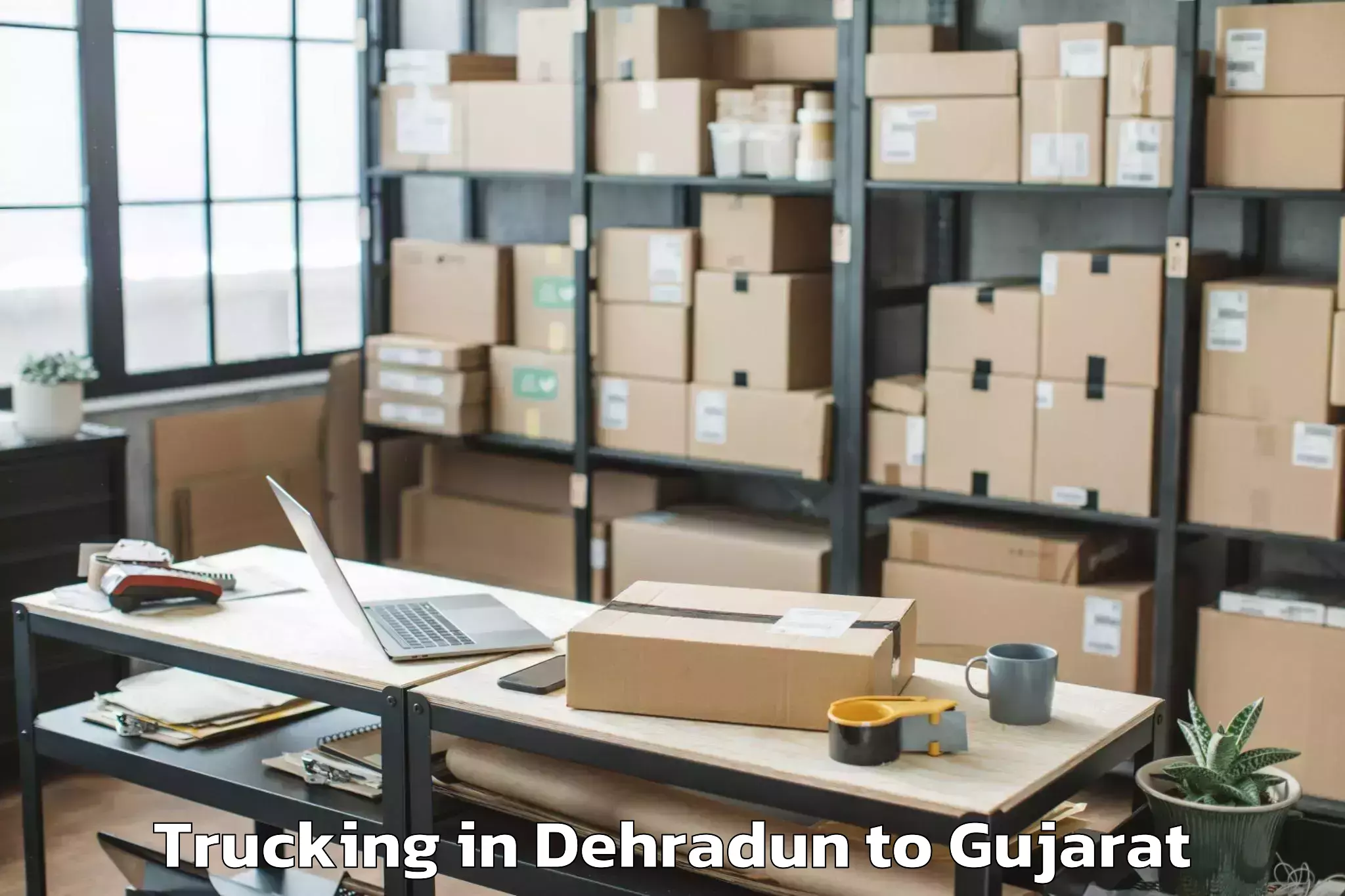 Book Your Dehradun to Mundra Trucking Today